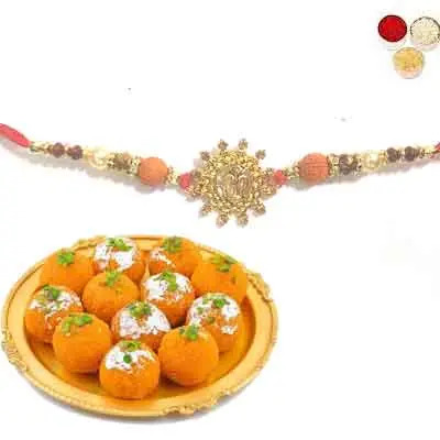 Beautiful Om Rakhi For Brother With Laddu
