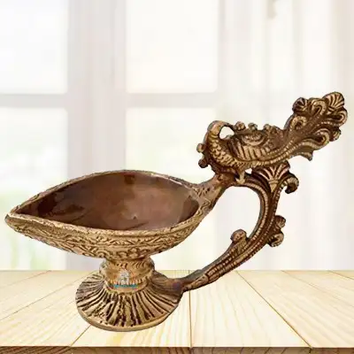 Brass Diya with Peacock Design Handle