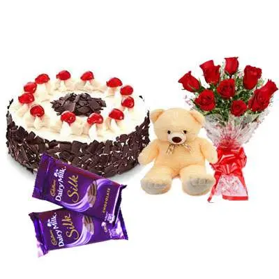 Black Forest Cake with Red Roses bouquet, Teddy Bear & Dairy Milk